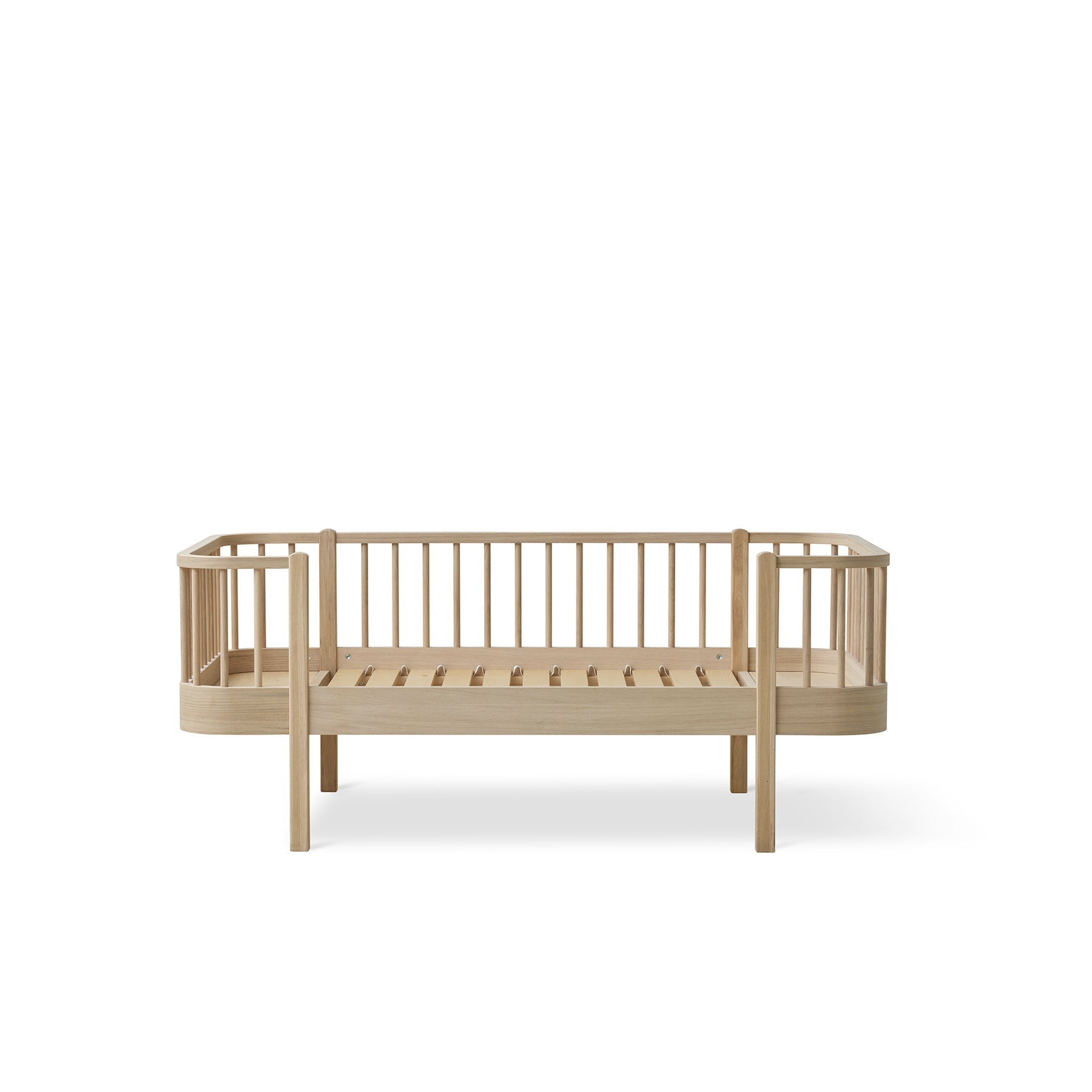 Wooden crib with a simple design on a white background