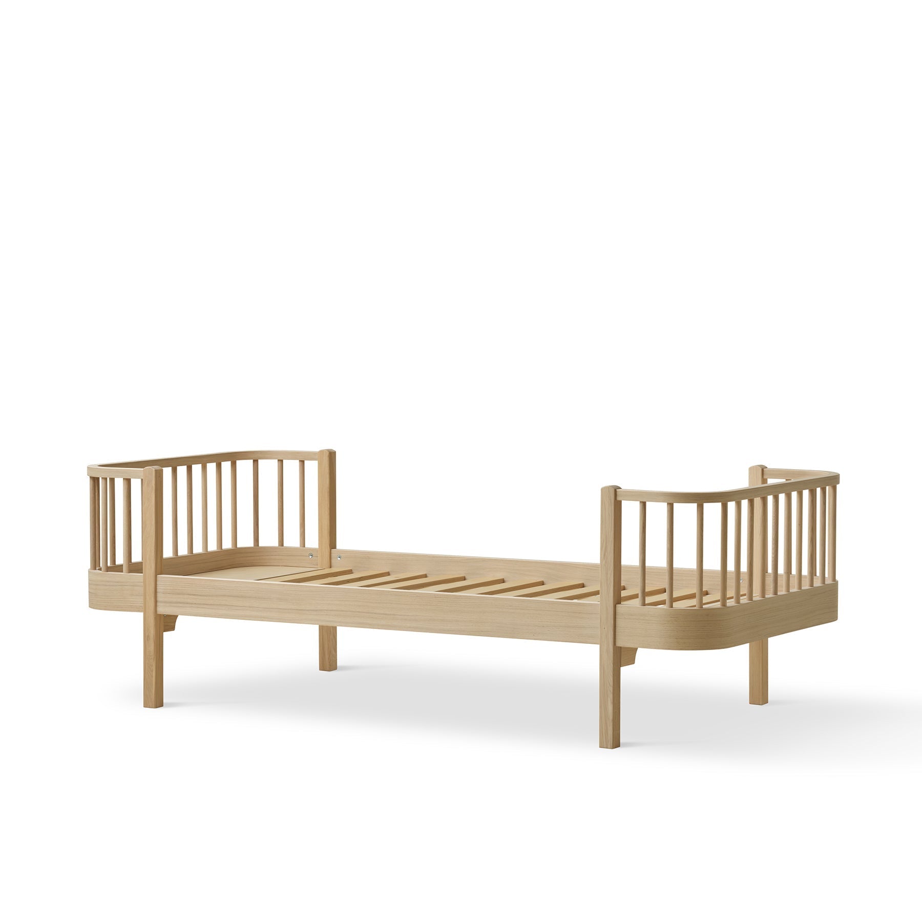 Wooden crib on a white background