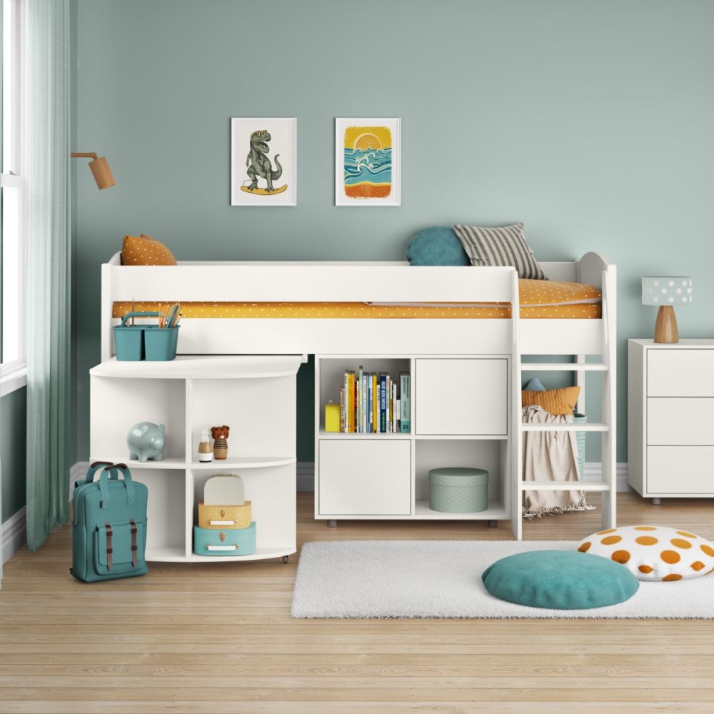 Children's room with a white loft bed, bookshelves, and toys.